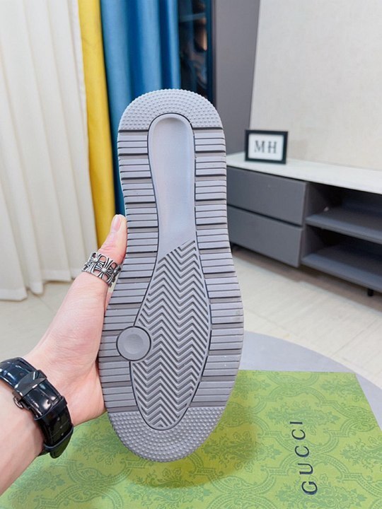 Gucci GG Embossed Sneakers