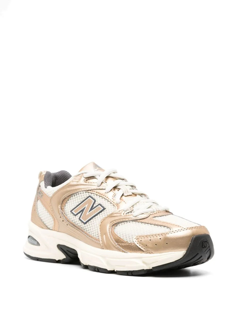 New Balance 530 tonalità oro