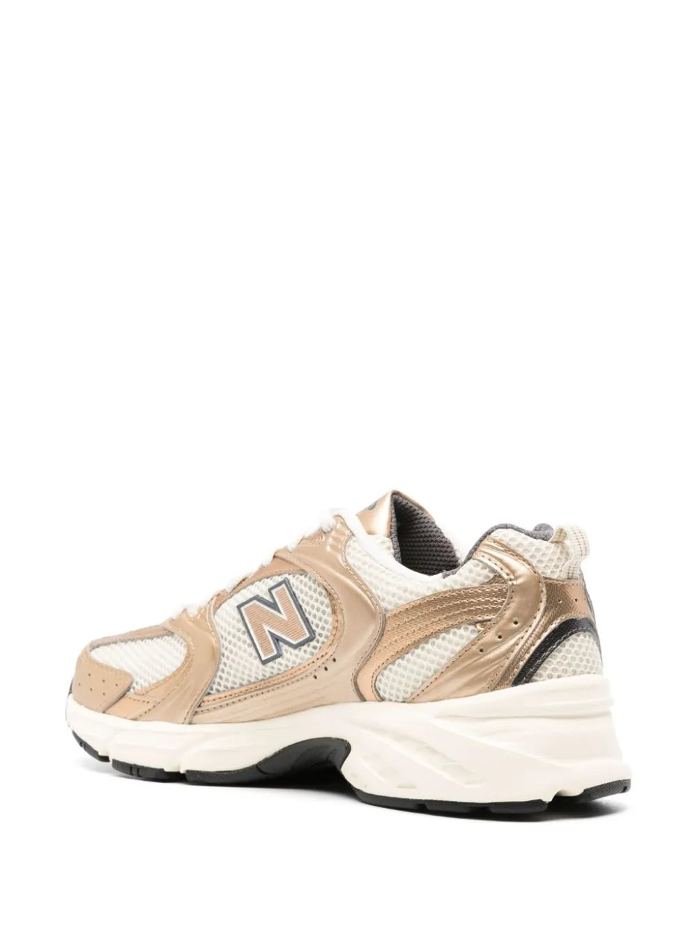 New Balance 530 tonalità oro