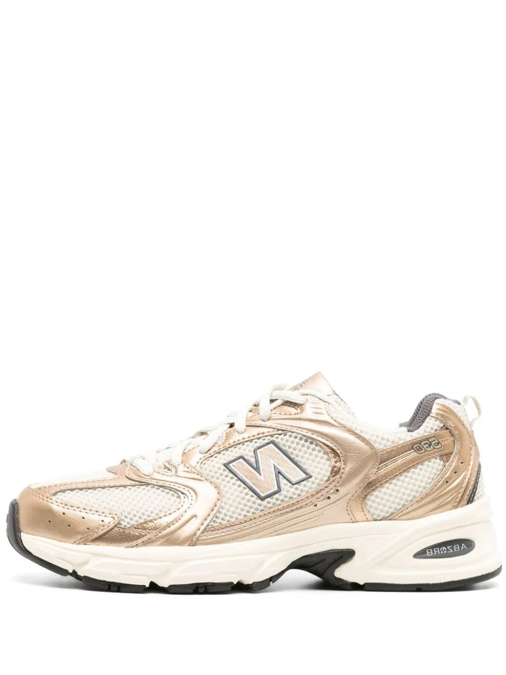 New Balance 530 tonalità oro