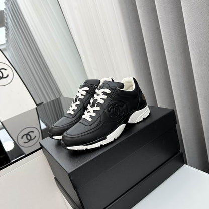 Chanel Black Calfskin Sneakers