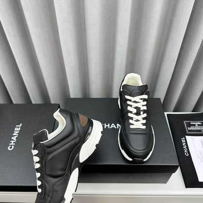 Chanel Black Calfskin Sneakers
